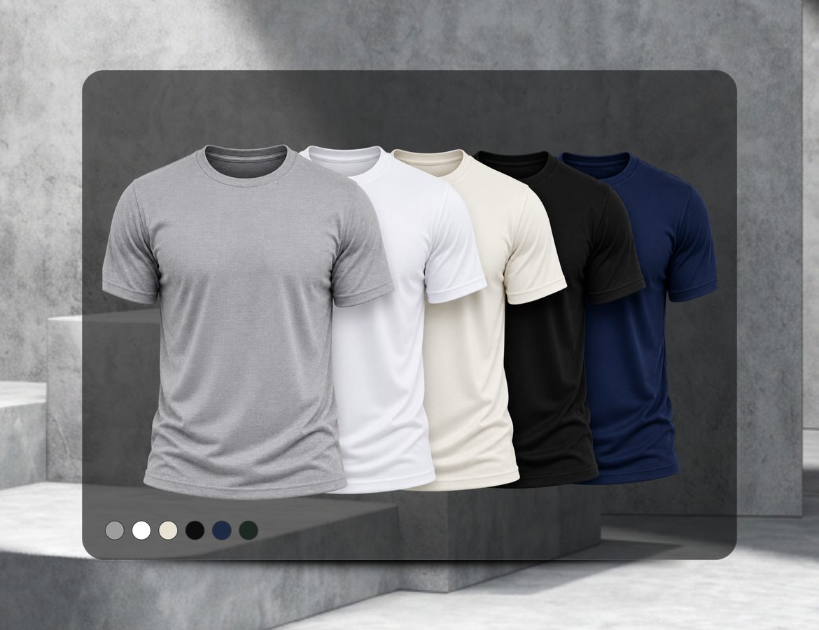 Cinco camisetas básicas Vankoff em cinza, branca, off white, preta e marinho, sobre um pódio de concreto claro.